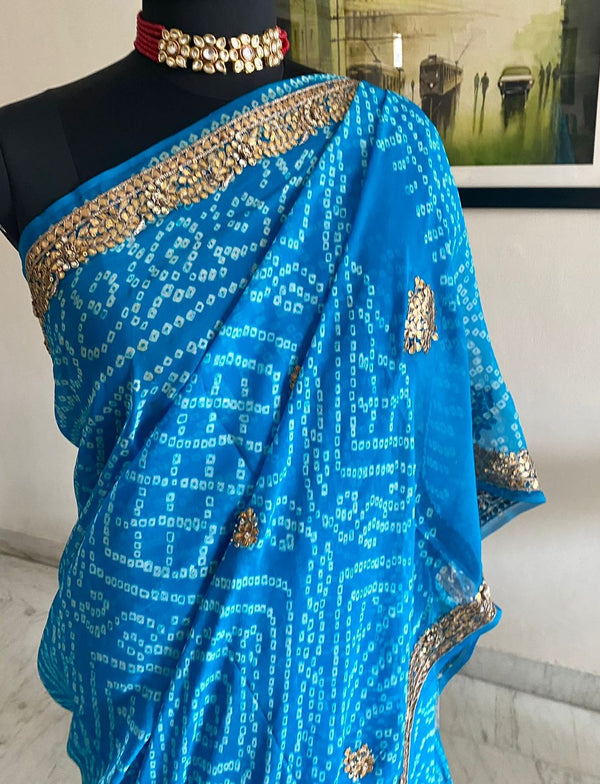 KIMAYA-  A BEAUTIFUL BLUE BANDHANI GEORGETTE WITH GOTA PATTI