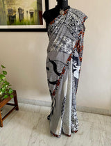 RESHMA- ELEVATE YOUR ELEGANCE, EMBRACE THE ALLURE OF OUR ECLECTIC BLACK AND WHITE CREPE SAREE