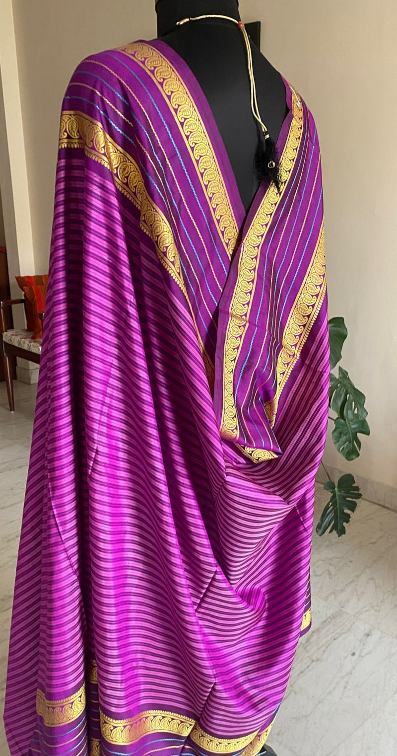 MAANVI- AN UNUSUAL SOFT MADURAI SILK SAREE  IN LIGHT AND DARK PURPLE STRIPES AND WOVEN BORDER AND AANCHAL