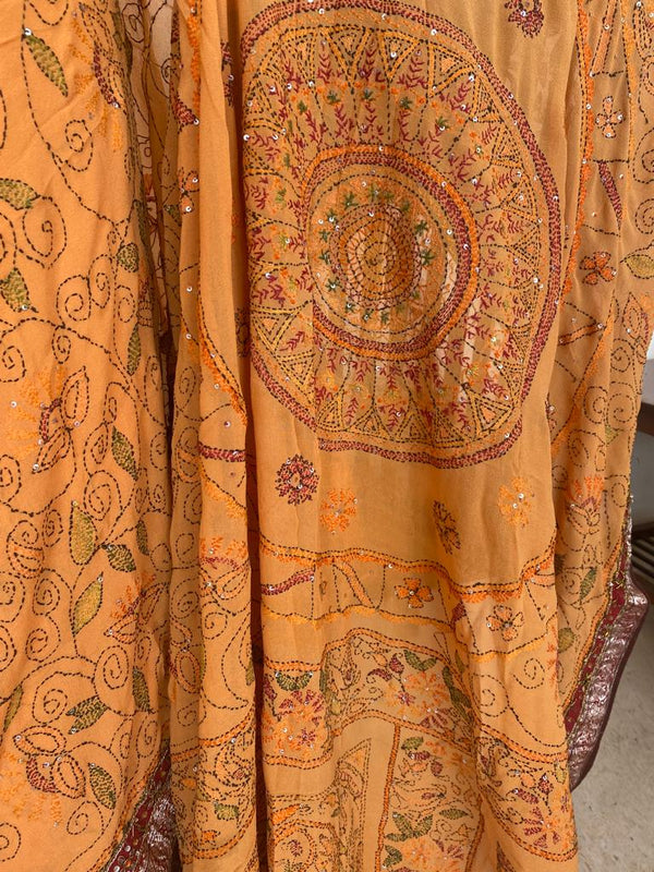 NAYANIKA- A BEAUTIFUL PURE GEORGETTE IN BEIGEISH ORANGE WITH KANTHA HAND EMBROIDERY AND A BANARASI BORDER