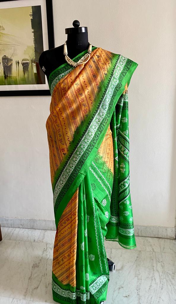 DYUTIMA- EMBRACE THE GRACE OF A PRINTED PATLI SILK SAREE IN OCHRE AND GREEN