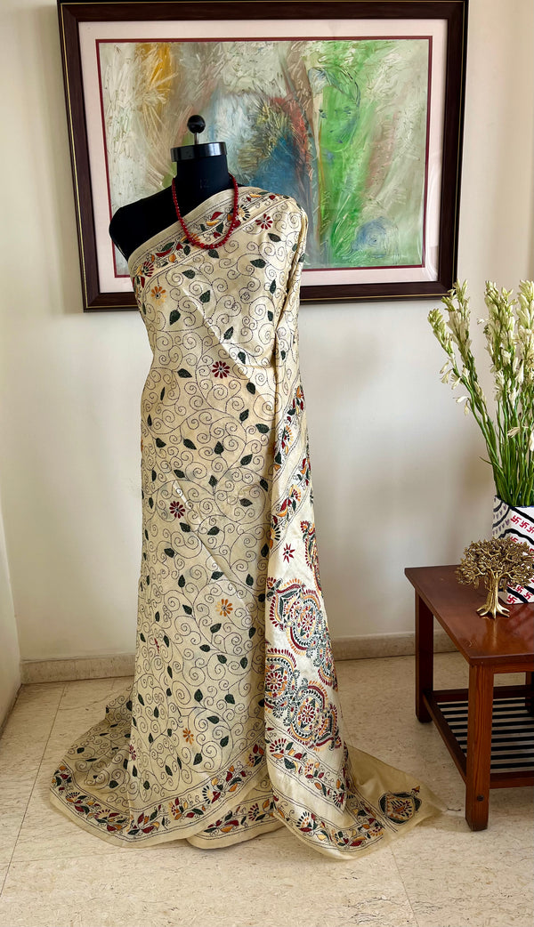 SWESHTI- CREAM TUSSAR KANTHA WITH FLORAL MOTIFS AND ELABORATE AANCHAL