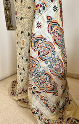 SWESHTI- CREAM TUSSAR KANTHA WITH FLORAL MOTIFS AND ELABORATE AANCHAL