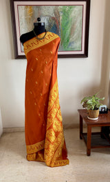 ANOMA — RUST ORANGE BALUCHARI WITH MUSICAL STORYTELLING