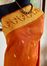 ANOMA — RUST ORANGE BALUCHARI WITH MUSICAL STORYTELLING