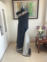 SHYAMI- BLACK POCHAMPALLY WITH WHITE FLORAL IKAT BORDER