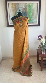 CHITRASHREE – VIBRANT CHECKS WITH TEMPLE AND PEACOCK WEAVE