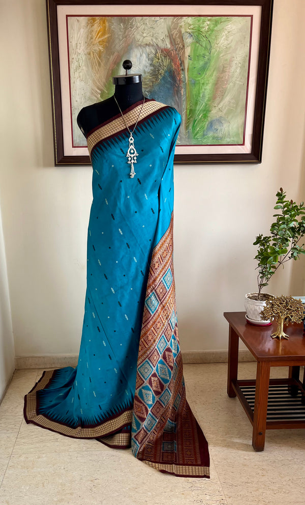 TANMAYA – BLUE BOMKAI SILK WITH RUDRAKSH AND MAROON TEMPLE BORDER