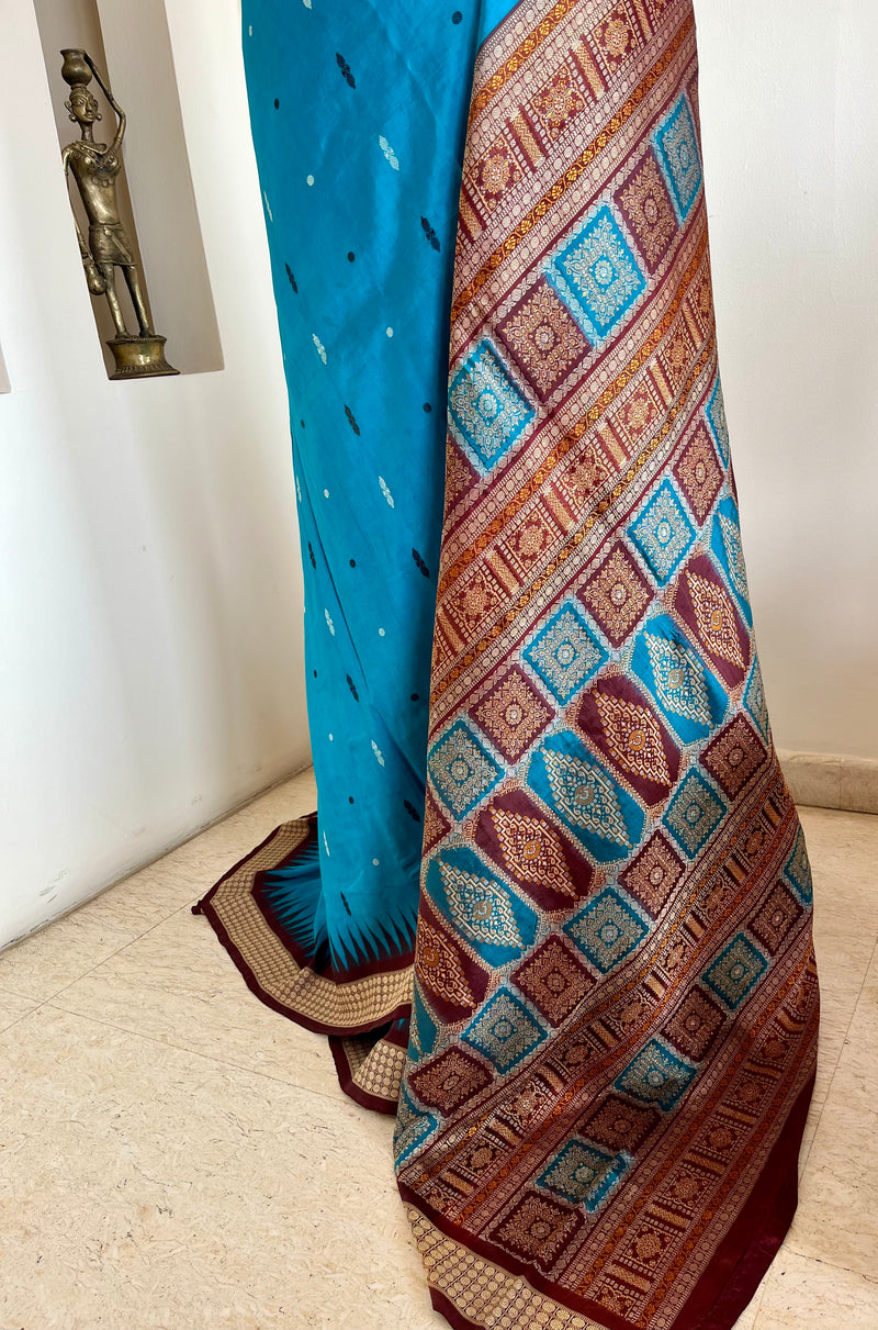 TANMAYA – BLUE BOMKAI SILK WITH RUDRAKSH AND MAROON TEMPLE BORDER