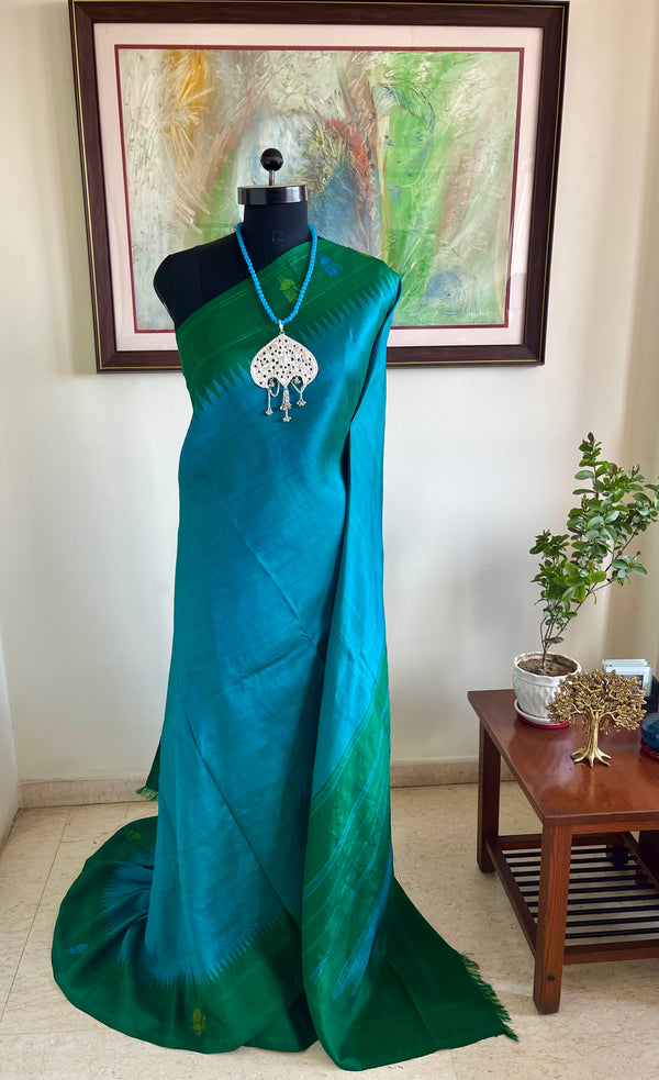 SUNEHA – SHOT BLUE KANJIVARAM WITH GREEN BLUE PEACOCK BORDER