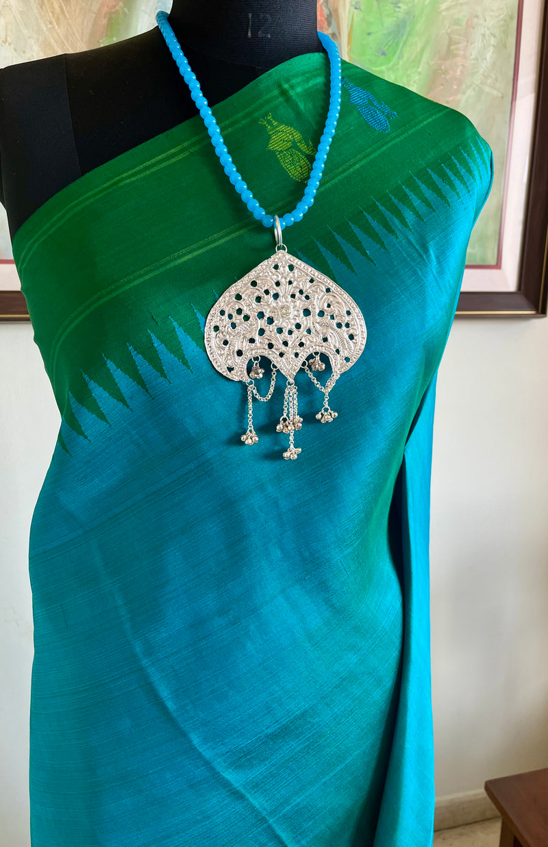 SUNEHA – SHOT BLUE KANJIVARAM WITH GREEN BLUE PEACOCK BORDER