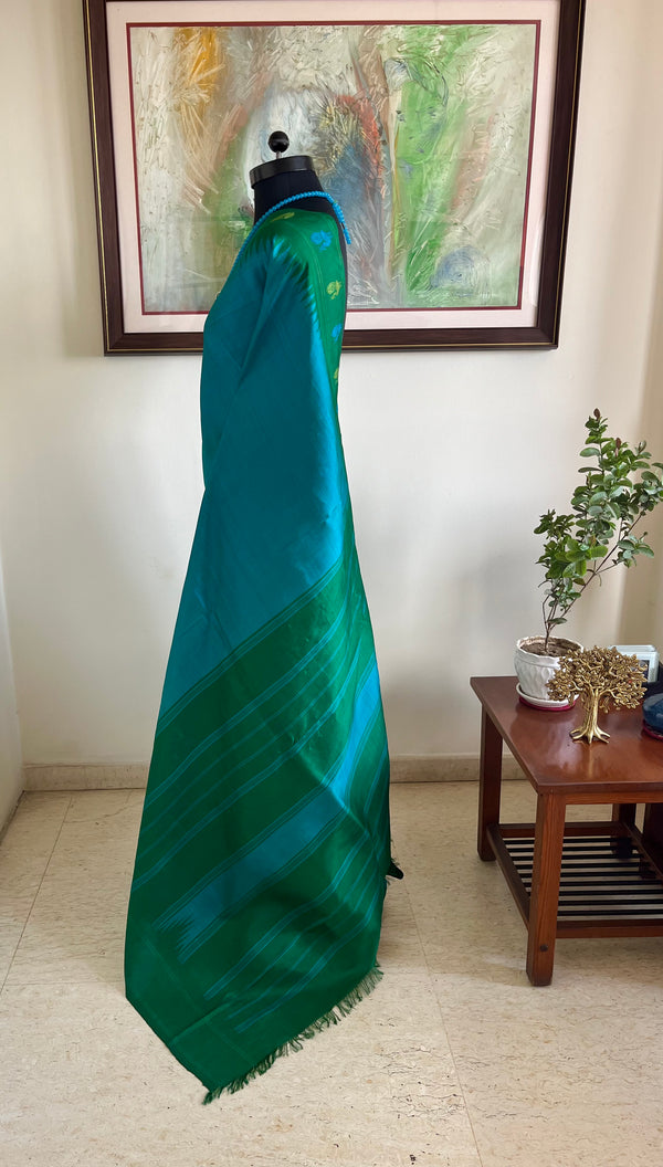 SUNEHA – SHOT BLUE KANJIVARAM WITH GREEN BLUE PEACOCK BORDER