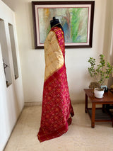 PRIYANGI – CREAM AND GOLD PATOLA WITH MAROON IKAT GEOMETRIC MOTIFS