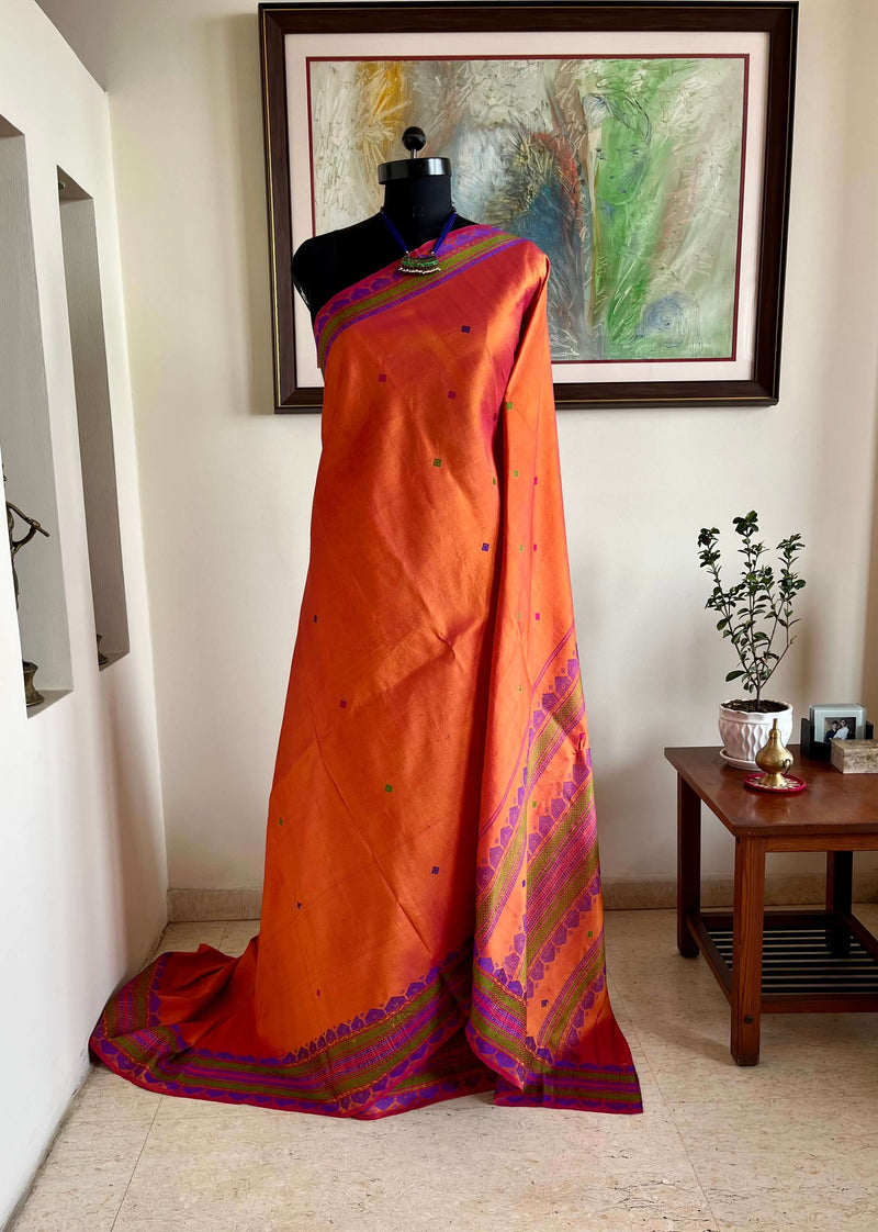 MALAROLI- BURNT ORANGE KANJIVARAM WITH VIBRANT THREADWORK MOTIFS