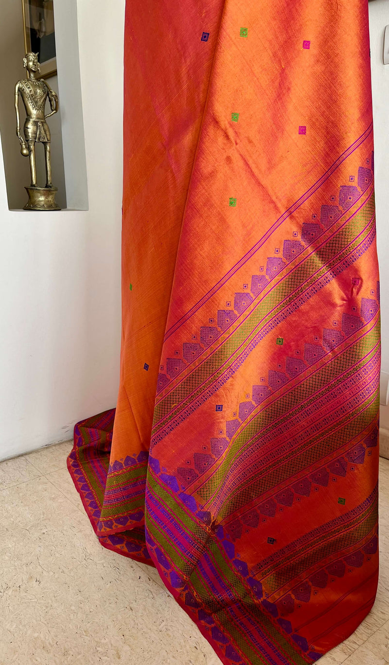 MALAROLI- BURNT ORANGE KANJIVARAM WITH VIBRANT THREADWORK MOTIFS