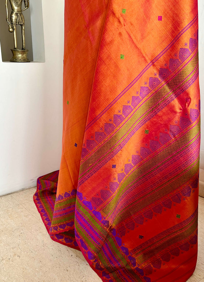 MALAROLI- BURNT ORANGE KANJIVARAM WITH VIBRANT THREADWORK MOTIFS