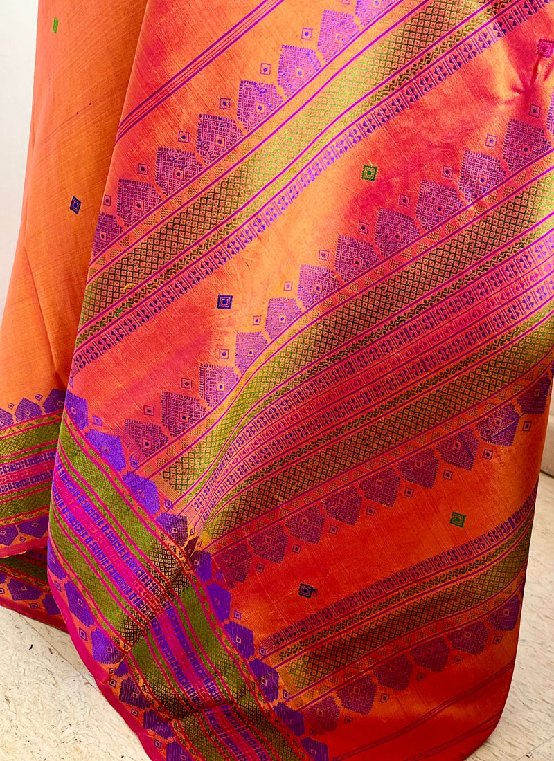 MALAROLI- BURNT ORANGE KANJIVARAM WITH VIBRANT THREADWORK MOTIFS