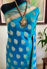 DEVALIKA – SHOT BLUE BANARASI WITH GOLD FLORAL MOTIFS