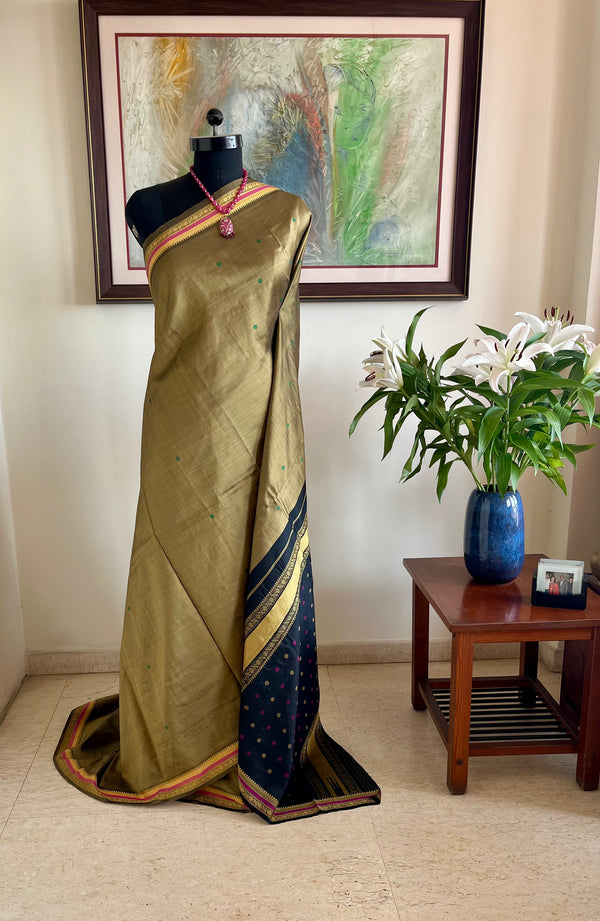 SUHITHA – OLIVE GREEN KANJIVARAM SILK SAREE WITH RUDRAKSH BORDER