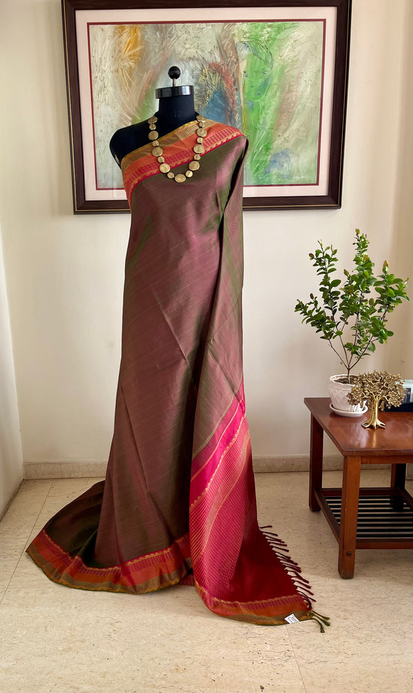 TANUYA – RUST AND GREEN SHOT KANJIVARAM WITH RUDRAKSHA ELEGANCE