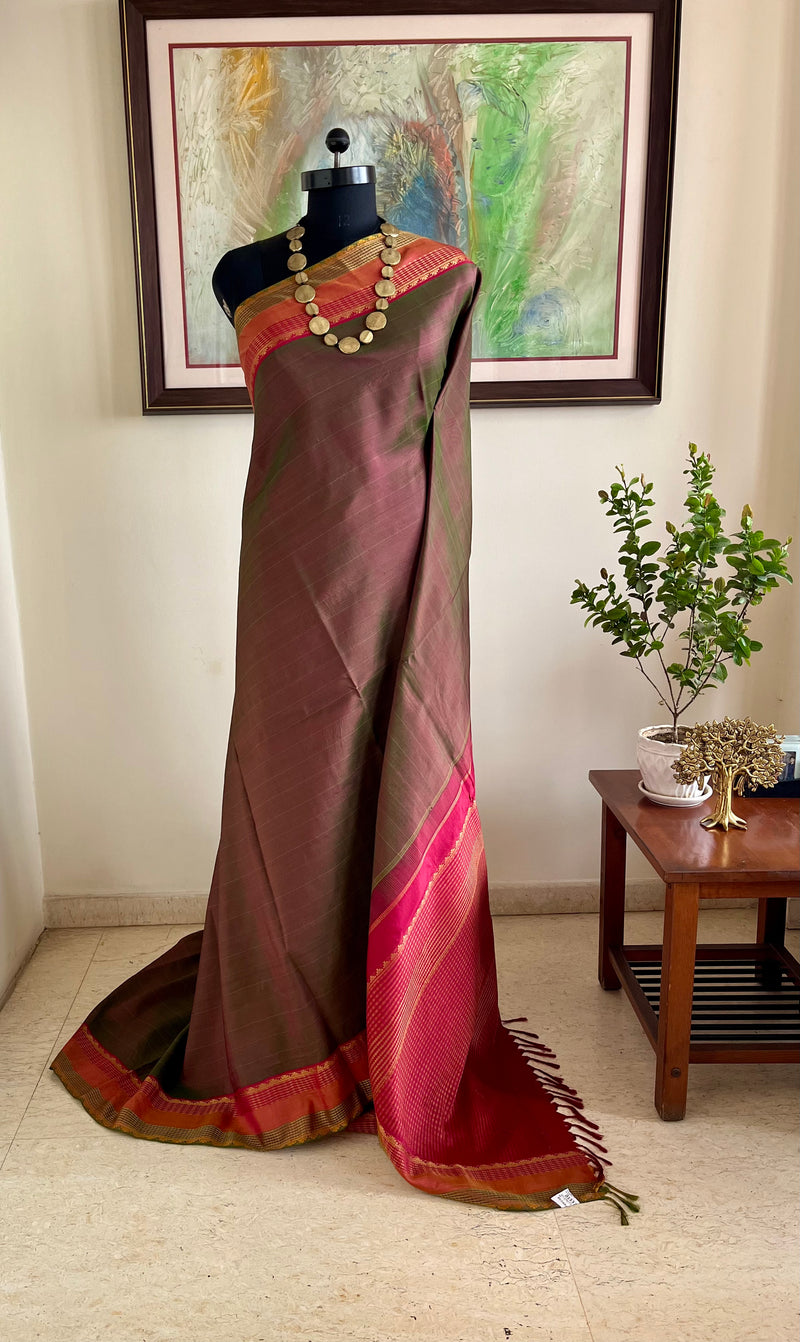 TANUYA – RUST AND GREEN SHOT KANJIVARAM WITH RUDRAKSHA ELEGANCE
