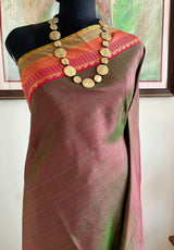 TANUYA – RUST AND GREEN SHOT KANJIVARAM WITH RUDRAKSHA ELEGANCE