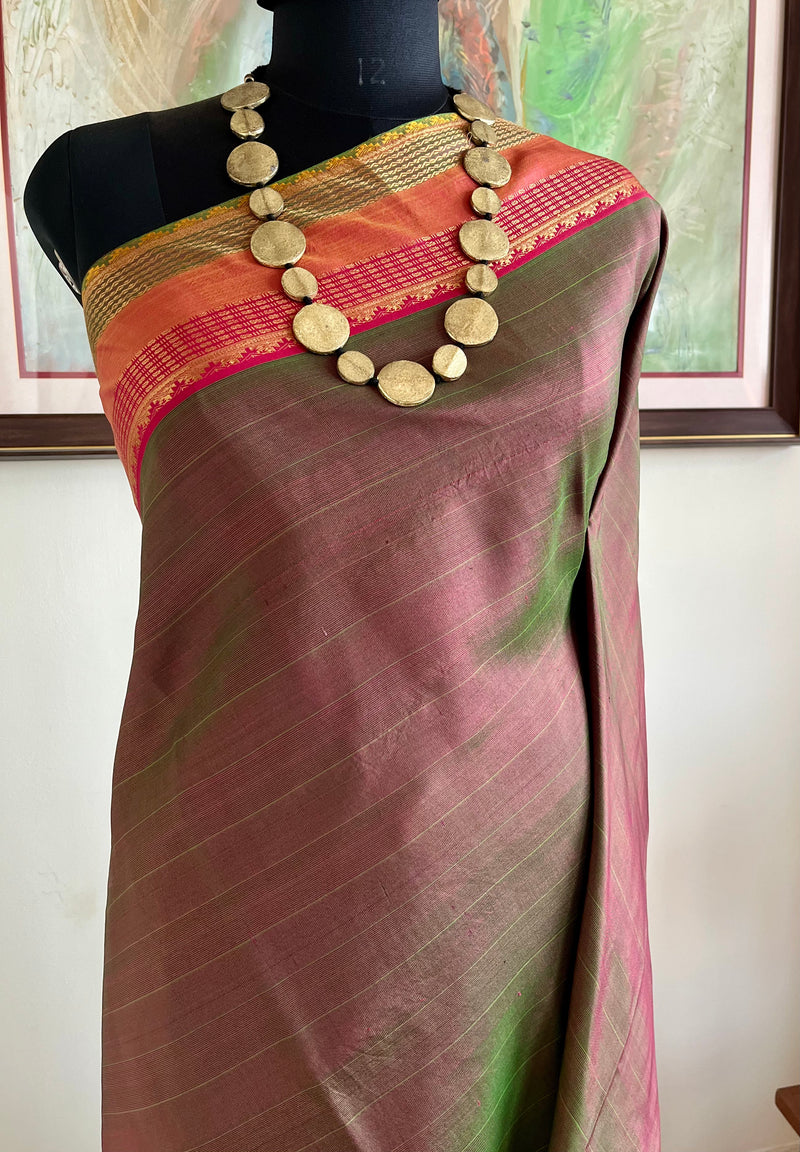 TANUYA – RUST AND GREEN SHOT KANJIVARAM WITH RUDRAKSHA ELEGANCE