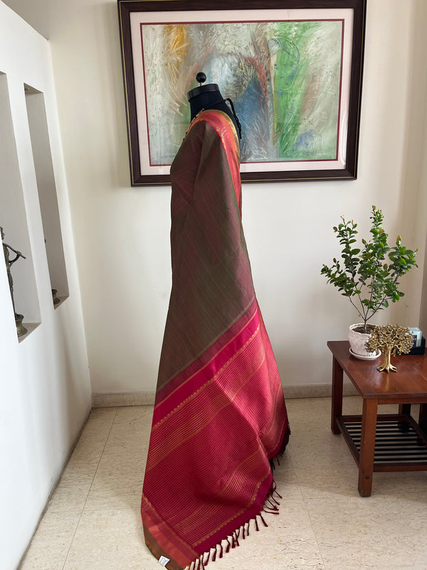 TANUYA – RUST AND GREEN SHOT KANJIVARAM WITH RUDRAKSHA ELEGANCE