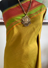 RITHYA – OCHRE KANJIVARAM WITH GREEN LINES AND RUST BORDERS