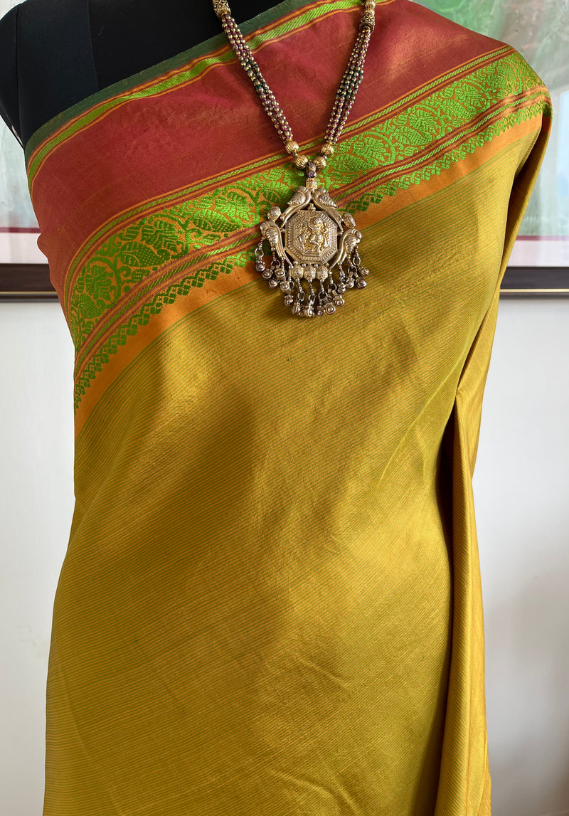 RITHYA – OCHRE KANJIVARAM WITH GREEN LINES AND RUST BORDERS