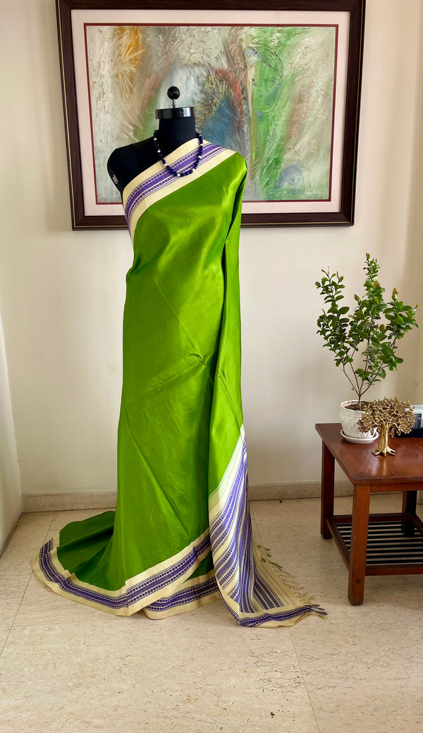 AARVITHA – KORVAI KANJIVARAM IN LEAF GREEN AND PURPLE ELEGANCE