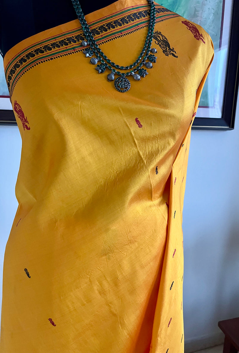 SARAYINI – GOLDEN YELLOW KANJIVARAM WITH MULTICOLOUR PEACOCK MOTIFS