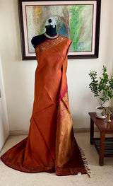 VAISHU – RUST BROWN KANJIVARAM SAREE WITH FLORAL ZARI BORDER