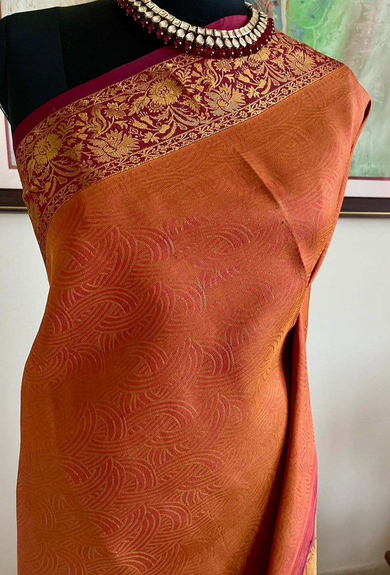 VAISHU – RUST BROWN KANJIVARAM SAREE WITH FLORAL ZARI BORDER