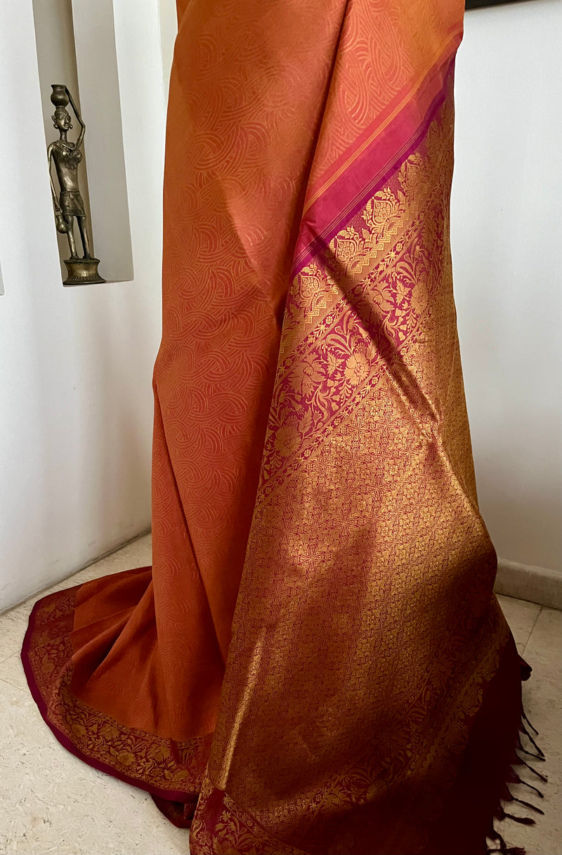 VAISHU – RUST BROWN KANJIVARAM SAREE WITH FLORAL ZARI BORDER