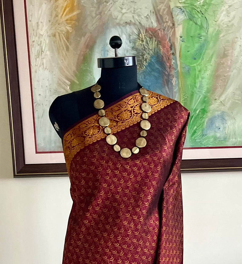 SARASIJA – MAROON KANJIVARAM WITH FLORAL GOLD THREAD ELEGANCE