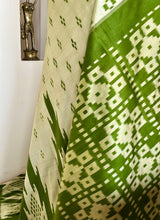 HITHA - GREENISH OFFWHITE POCHAMPALLY WITH TEMPLE BORDERS AND GEOMETRIC AANCHAL