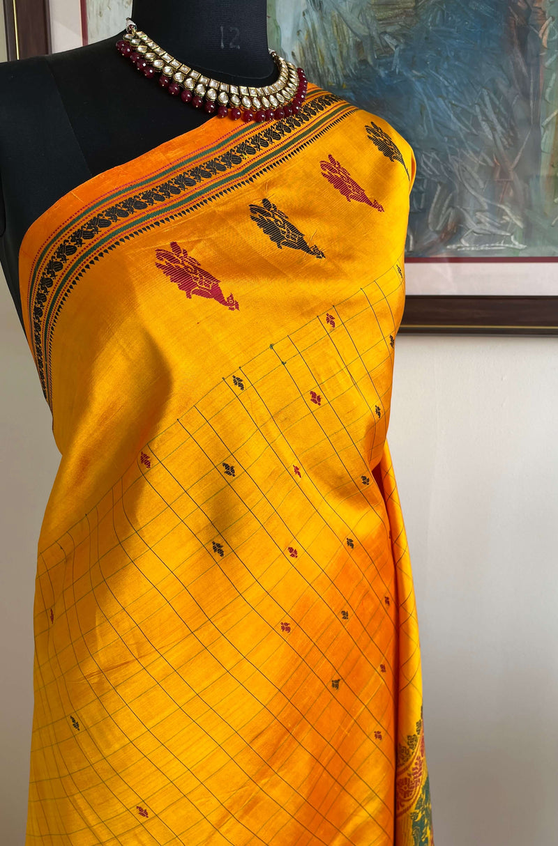 KUNTHAVI – GOLDEN YELLOW KANJIVARAM WITH PEACOCK AND FLORAL MOTIFS