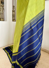 SAYURI – LEAF GREEN KORVAI KANJIVARAM WITH NAVY BLUE BORDERS