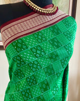 RASMILATA – GREEN SAMBALPURI BANDHA WITH A SPECTACULAR FLORAL AANCHAL