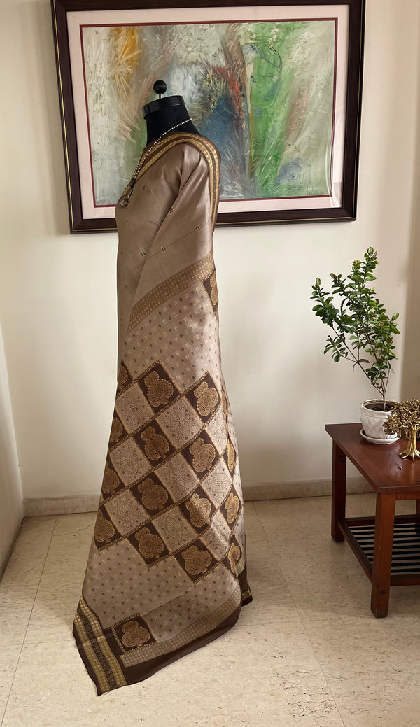 KAVIRA – GREYISH MAUVE BOMKAI SILK WITH RUDRAKSHA BORDER