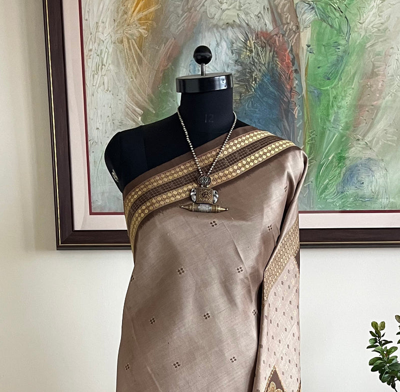 KAVIRA – GREYISH MAUVE BOMKAI SILK WITH RUDRAKSHA BORDER