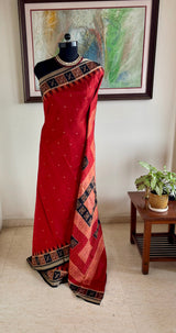 SUVINA — RUST BOMKAI SILK WITH A STRIKING GEOMETRIC AANCHAL