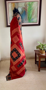 SUVINA — RUST BOMKAI SILK WITH A STRIKING GEOMETRIC AANCHAL