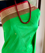 BANAJYOTSANA — GREEN BOMKAI SILK WITH AN INTRICATELY WOVEN AANCHAL