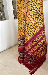 KEYURI – YELLOW PATOLA WITH STRIKING IKKAT MOTIFS