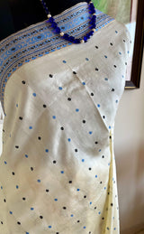 SUBORNA – CREAM ASSAM SILK WITH BLUE FLORAL MOTIFS
