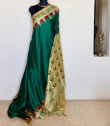 CHARMI- ELEGANT GREEN PATOLA SILK SAREE WITH EXQUISITE PEACOCK MOTIFS