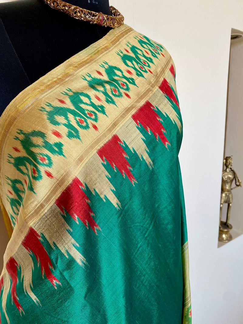 CHARMI- ELEGANT GREEN PATOLA SILK SAREE WITH EXQUISITE PEACOCK MOTIFS