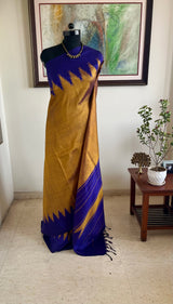 KAVINDHI – MUSTARD GOLD KANJIVARAM WITH PURPLE TEMPLE MOTIFS